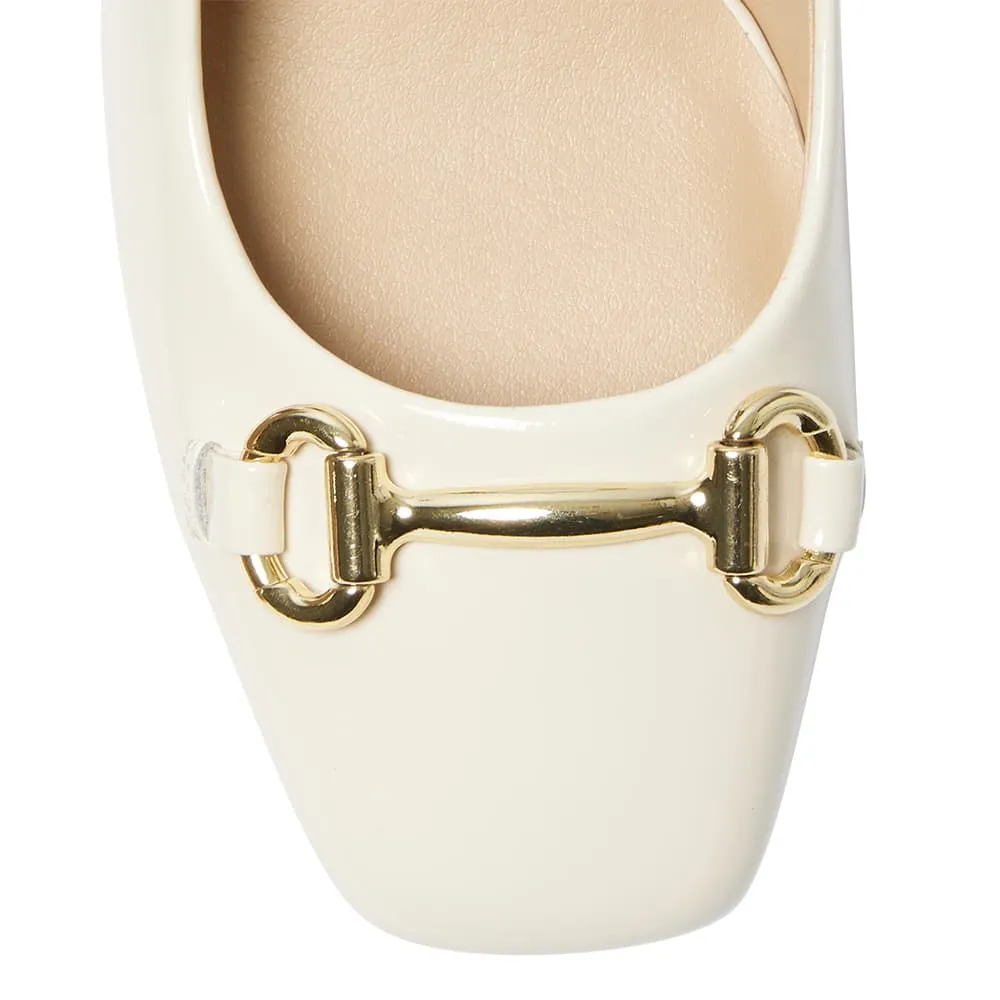 Goldie Heel in Bone Patent